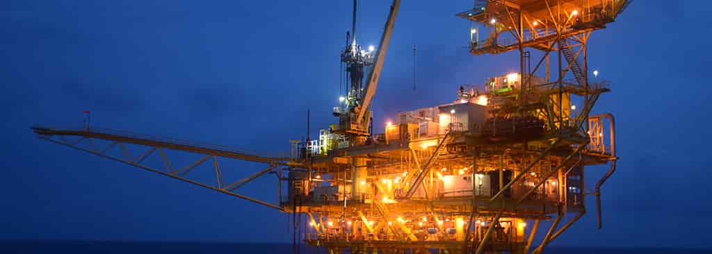 An offshore rig at night